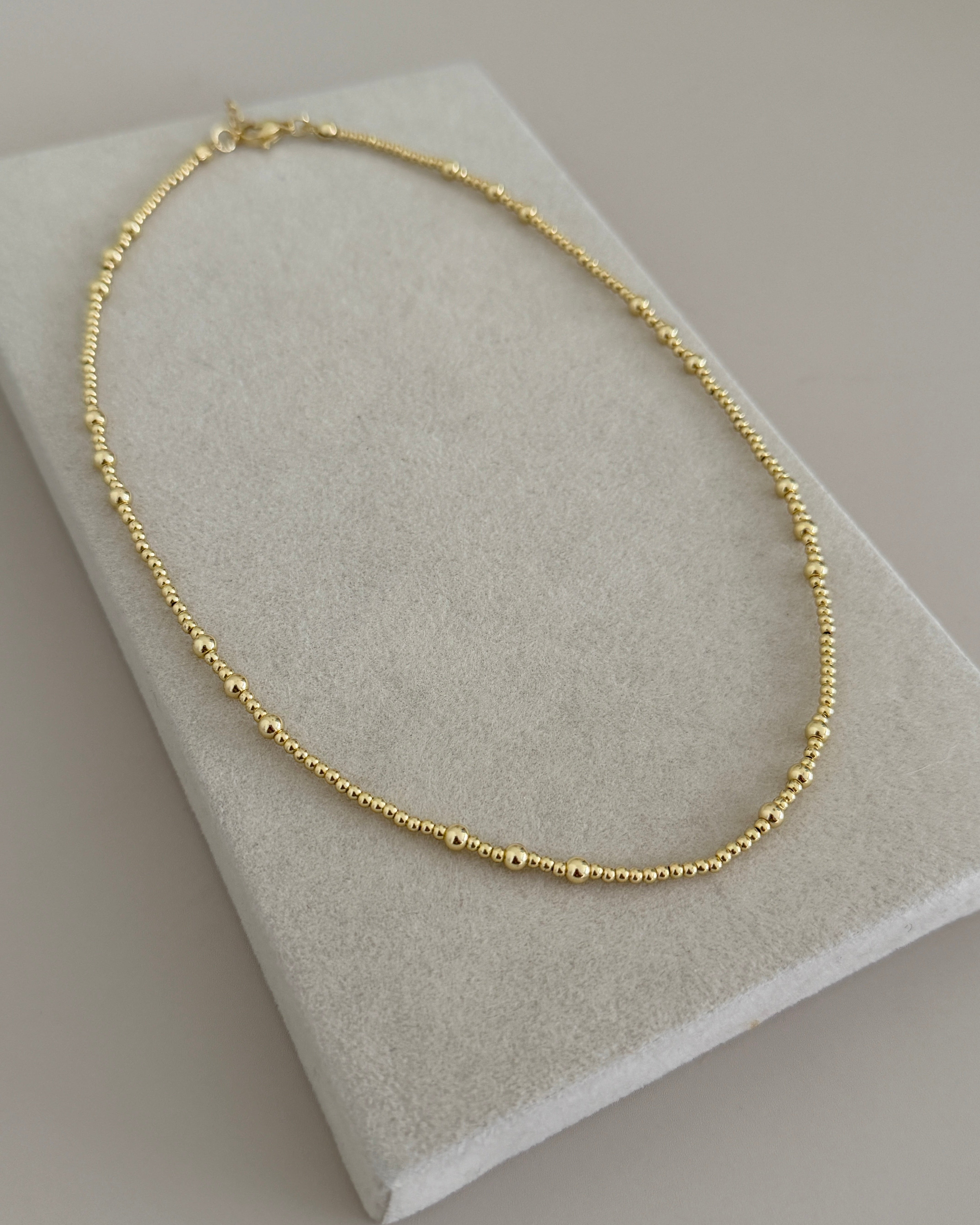Graduated Gold Bead Necklace