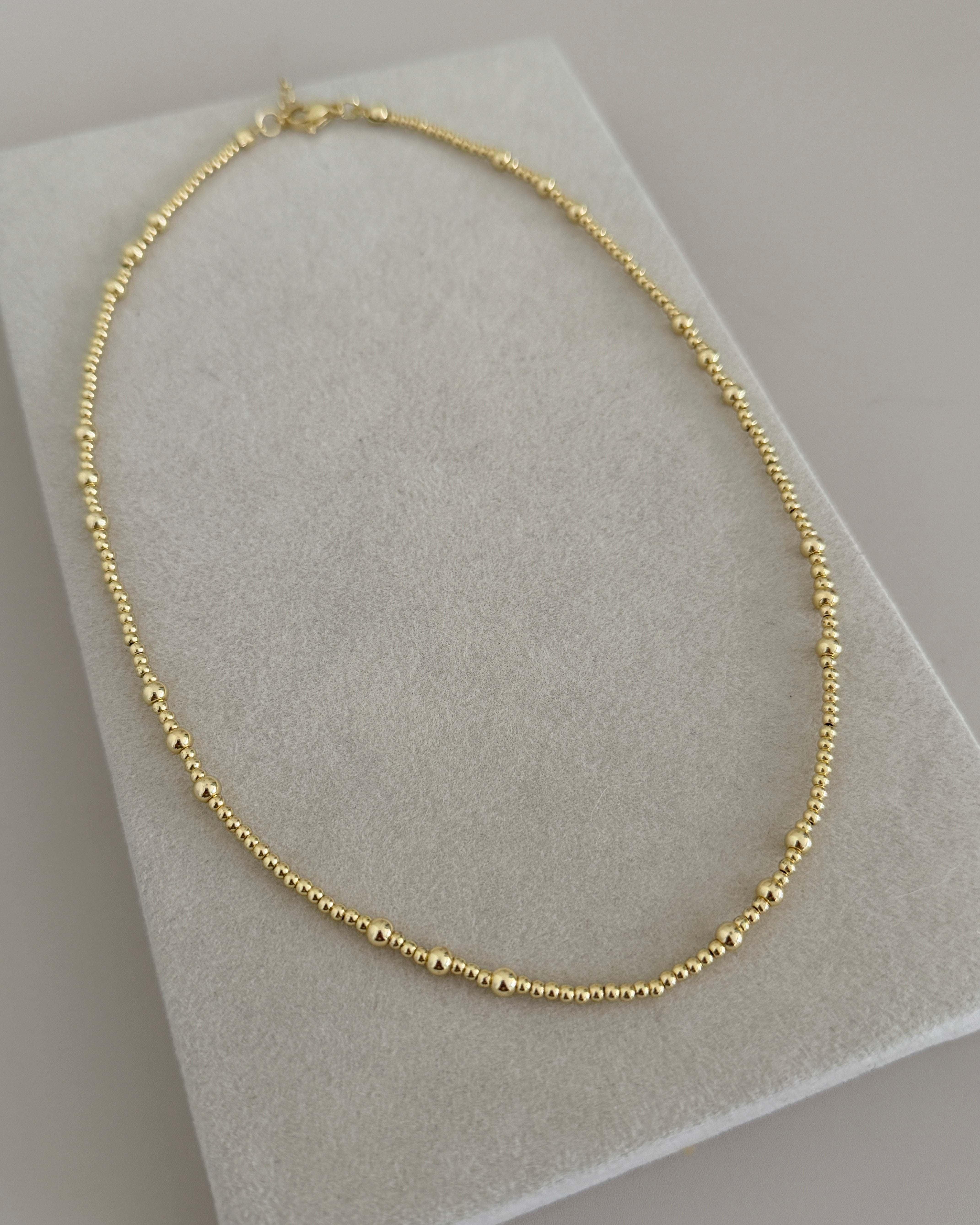 Graduated Gold Bead Necklace