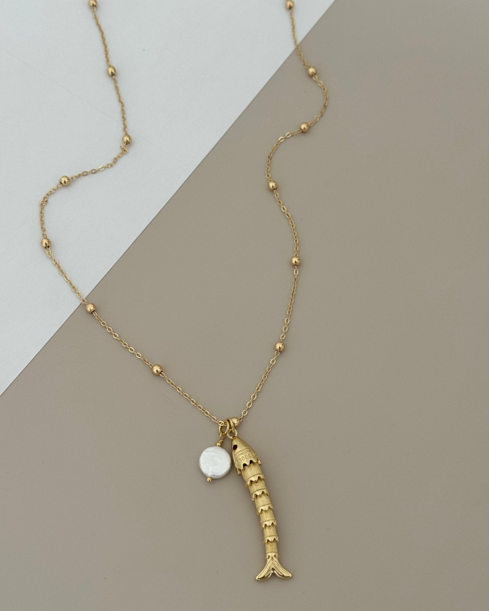 Gold Beaded Necklace with Articulated Fish Pendant - Necklace | LimaLimón Store - 1
